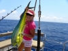 audrey-cating-a-dorado-mahi-mahi