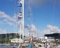 NYC ensign on Ruth 11 in Caribean dockside.