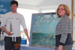 Finn receiving his prize from Joan Collins, Commodore, Baltimore SC